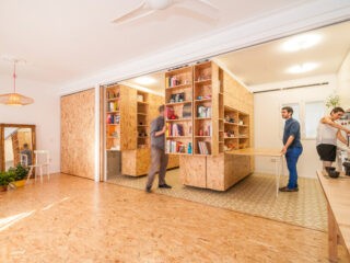 Small Apartment Uses Movable Shelving to Create Endless Design Combinations