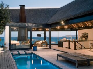 Thatched Roof Beach House with Outdoor Entertaining Spaces