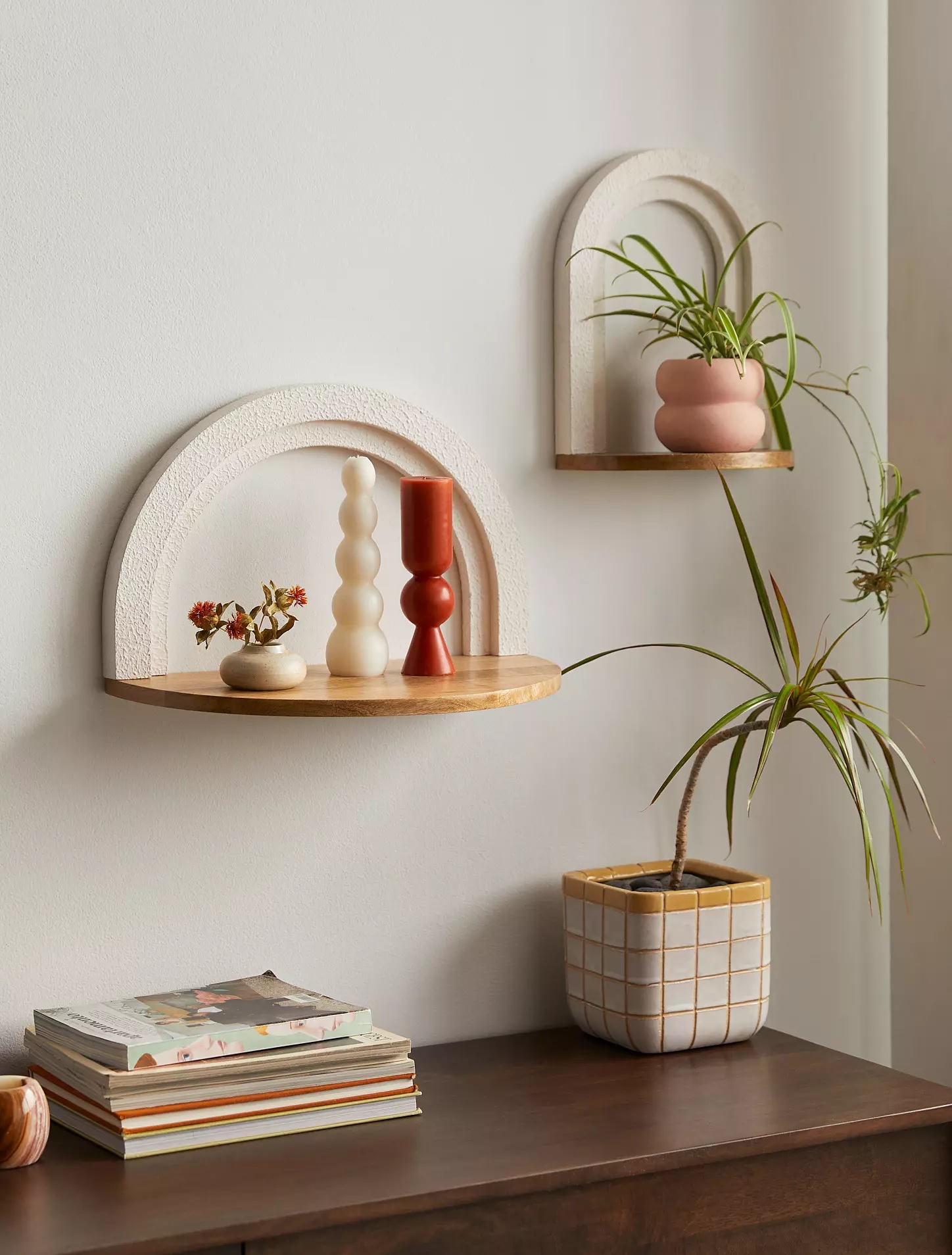 Two arched wall shelves