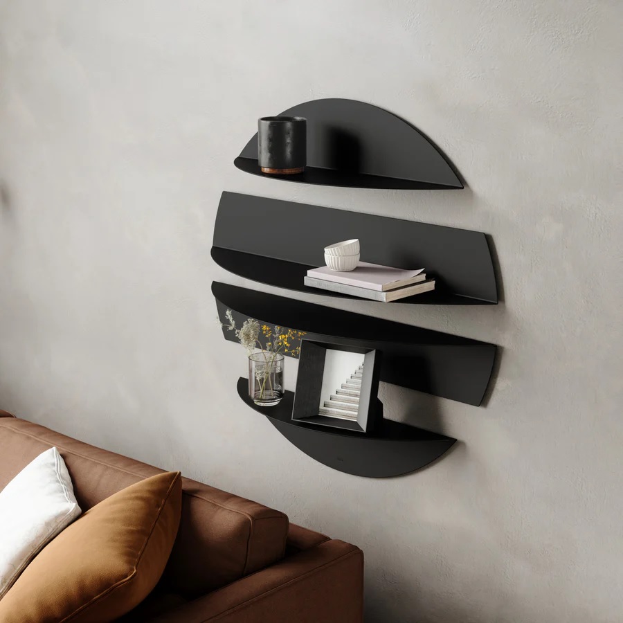 Four-piece black metal shelving set with circular shape