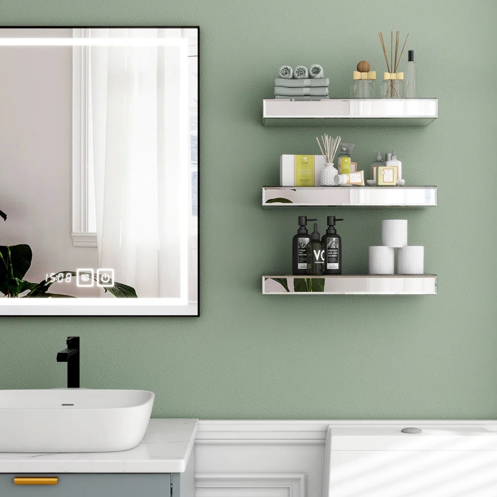 Three mirrored small shelves