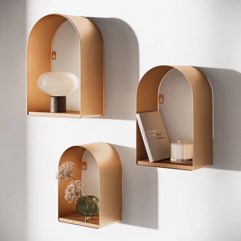 Three arched gold shelves