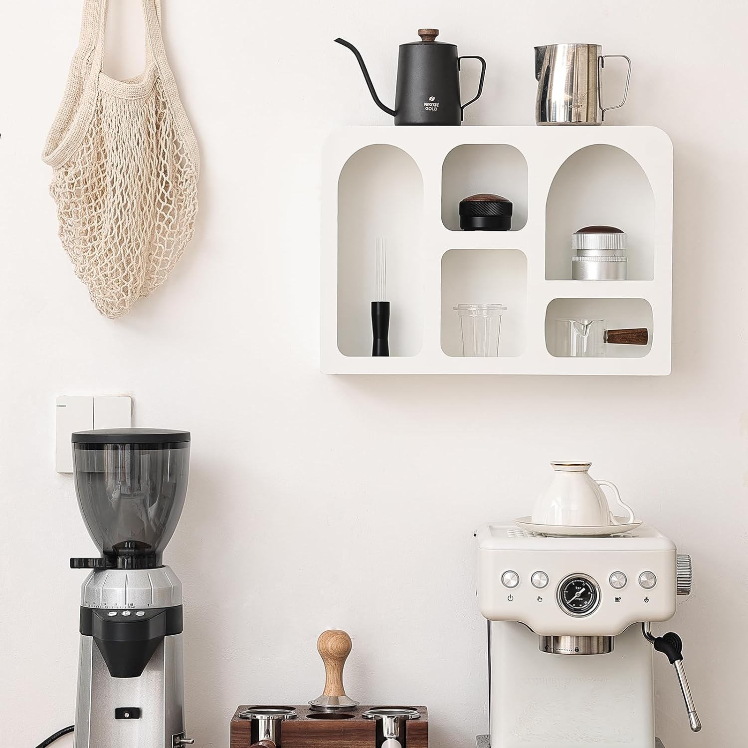 White shelves with arch-shaped niches