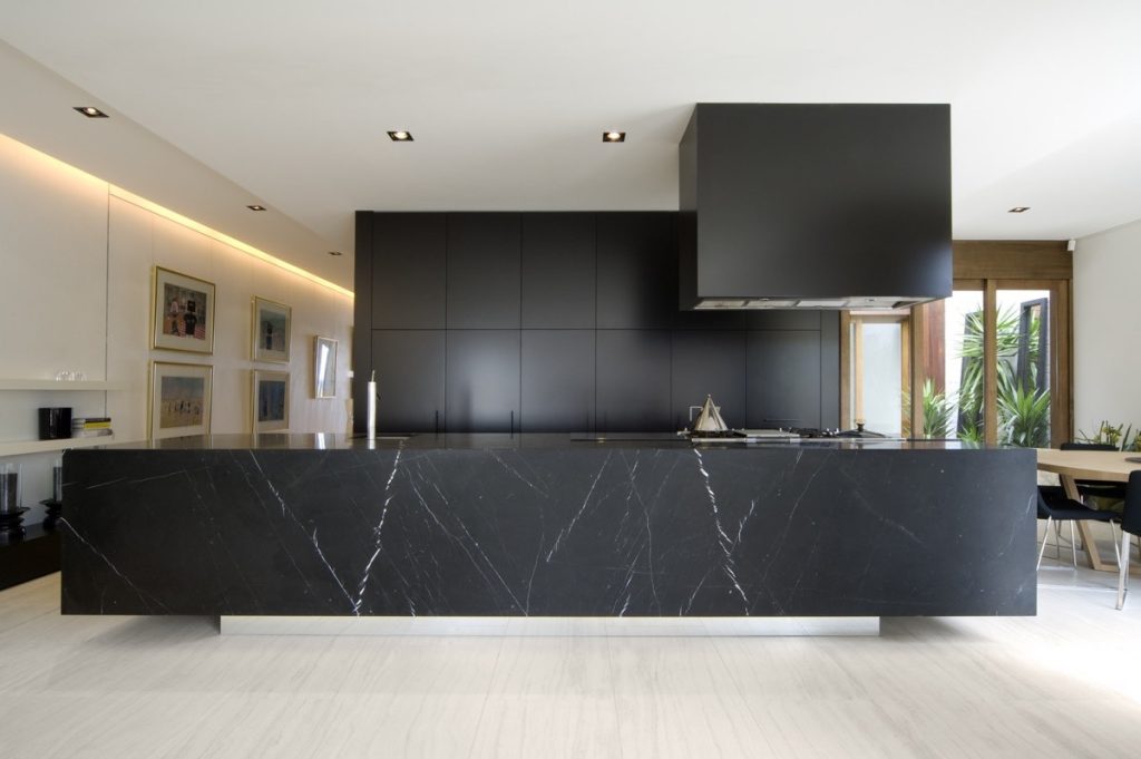 black modern kitchen with marble