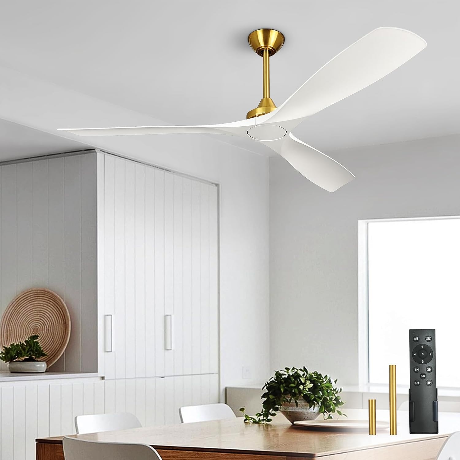 Modern white ceiling fan hanging in dining room