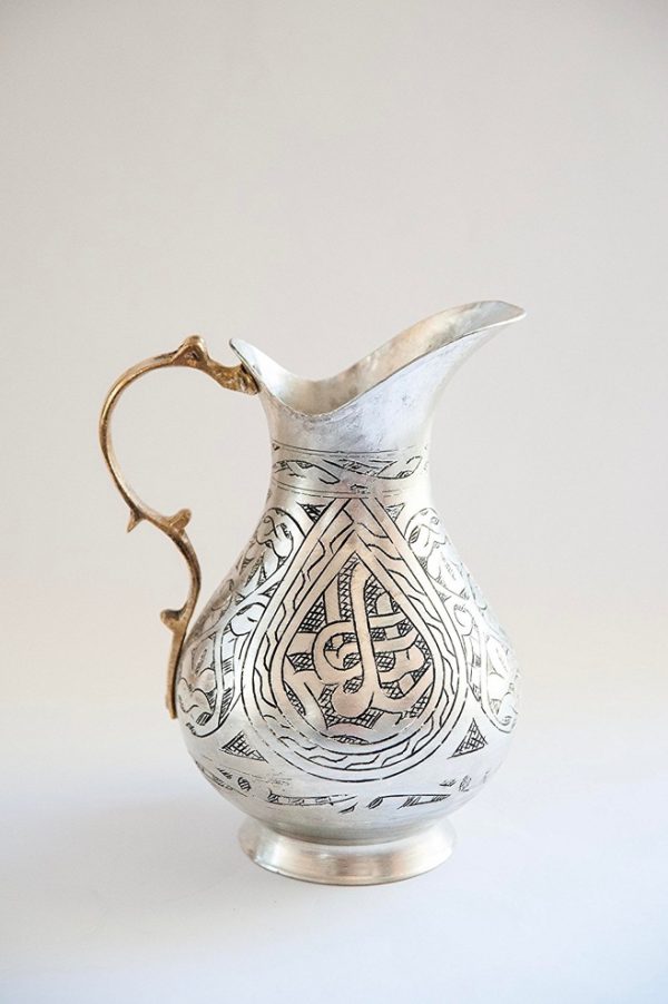 https://www.home-designing.com/wp-content/uploads/2017/02/turkish-style-copper-pitcher-600x902.jpg