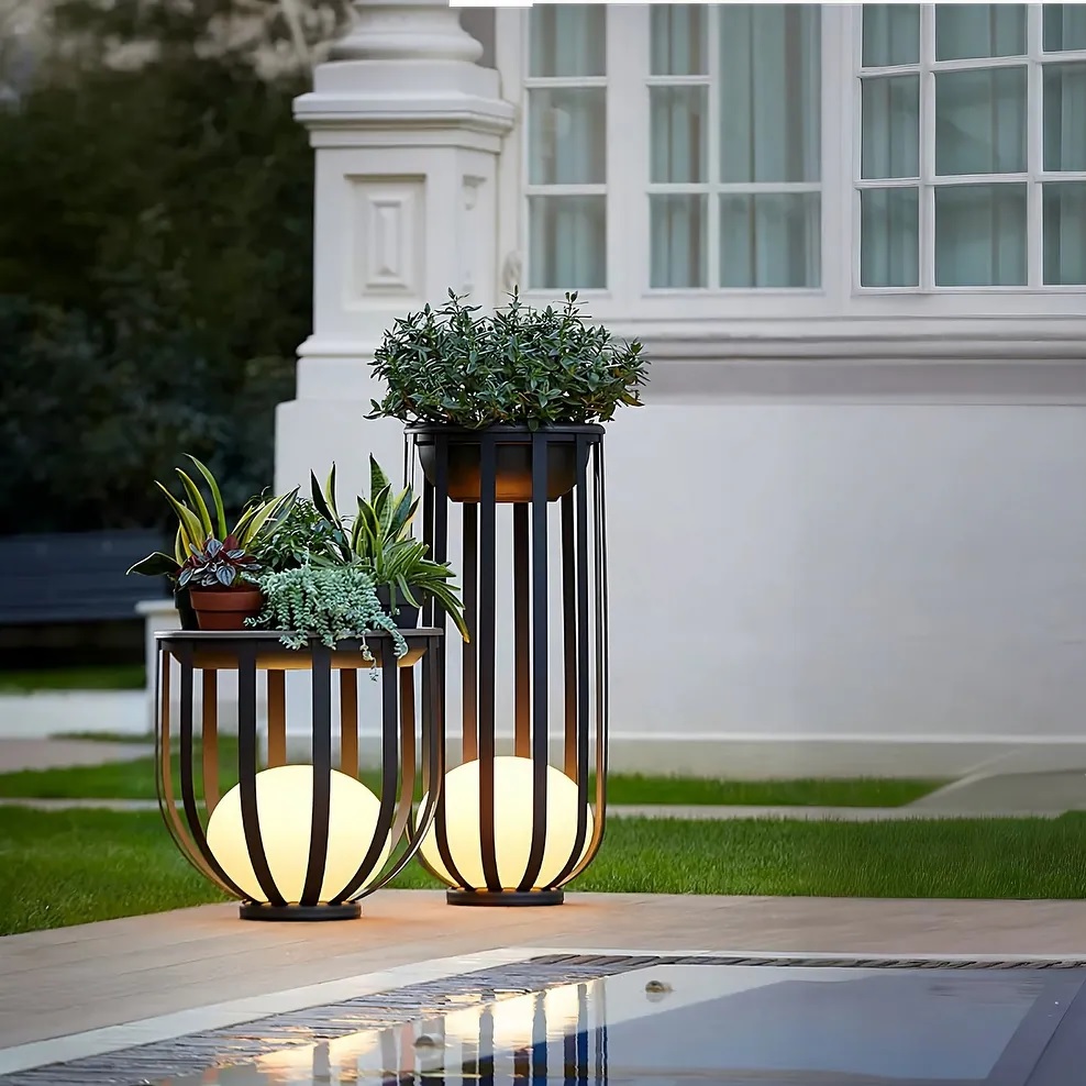 Two illuminated plant stands