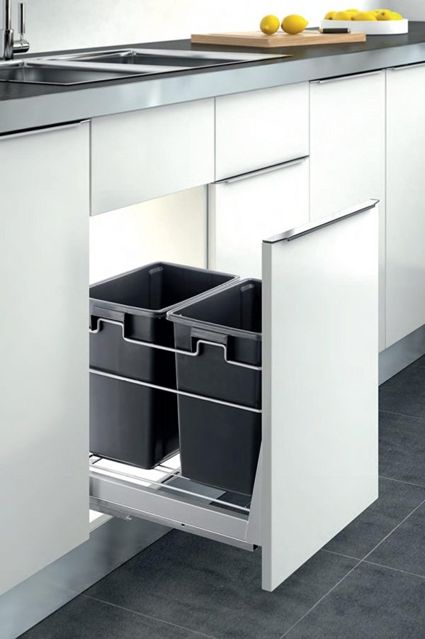 https://www.home-designing.com/wp-content/uploads/2017/05/pull-out-drawer-kitchen-large-trash-cans-600x901.jpg