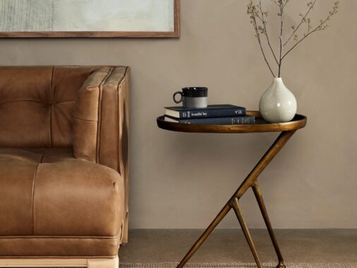 Three-legged brass end table