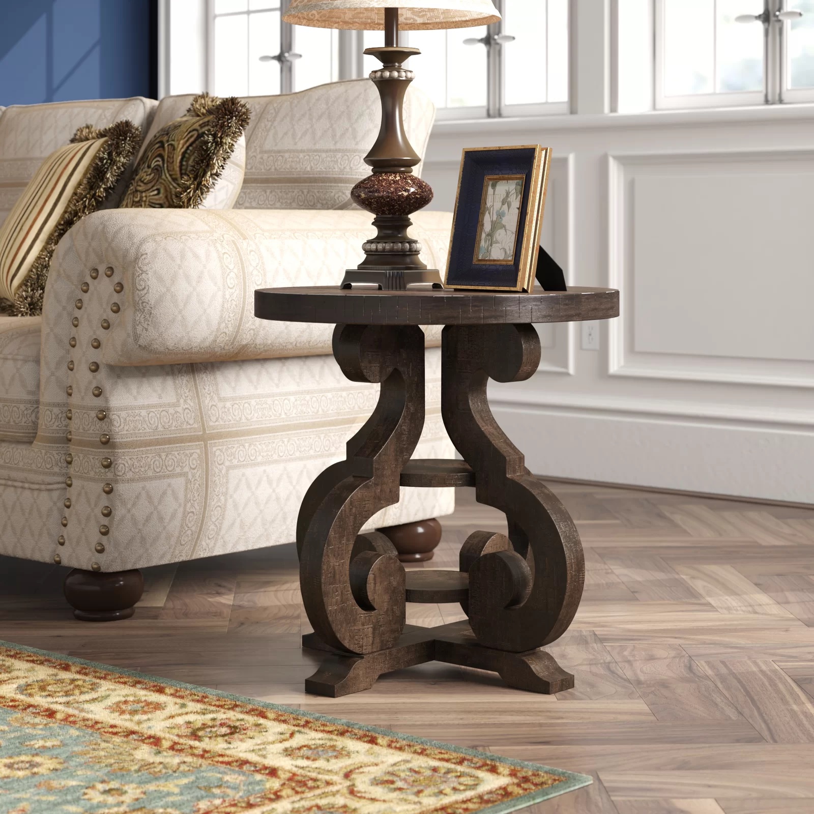 Wooden end table with scrollwork base