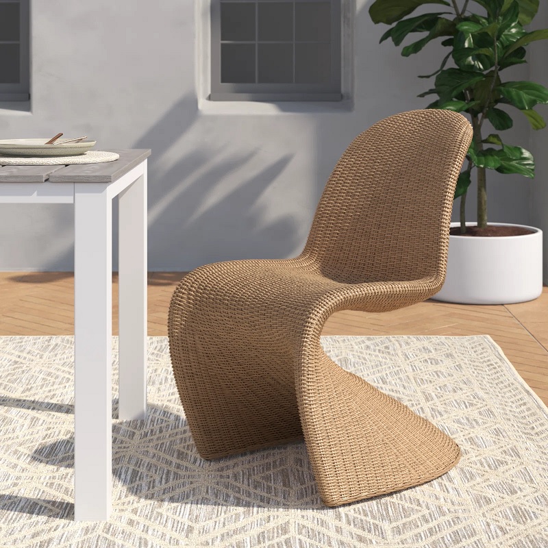 panton-style outdoor dining chair made from rattan