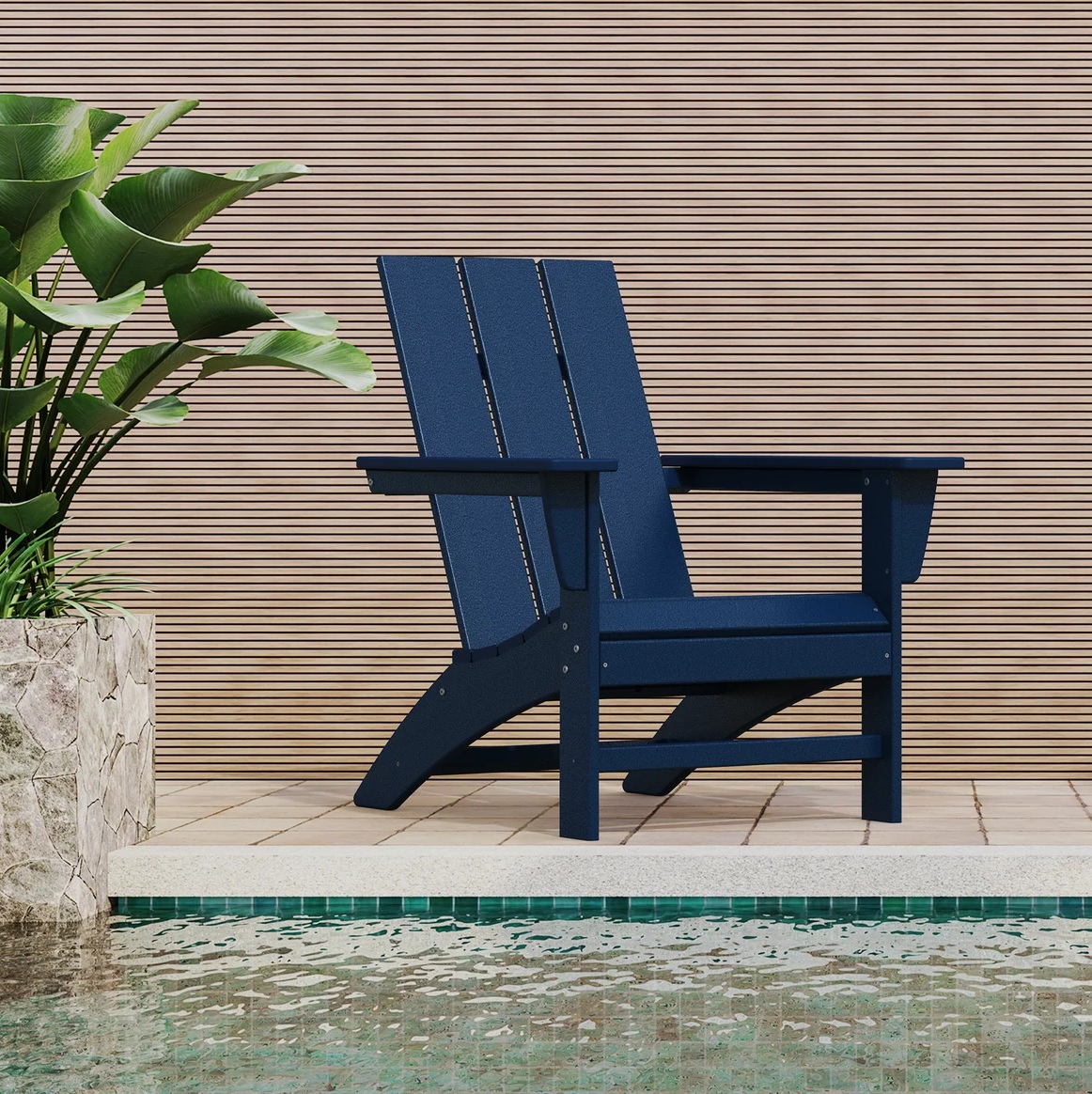 modern blue Adirondack chair sitting beside pool