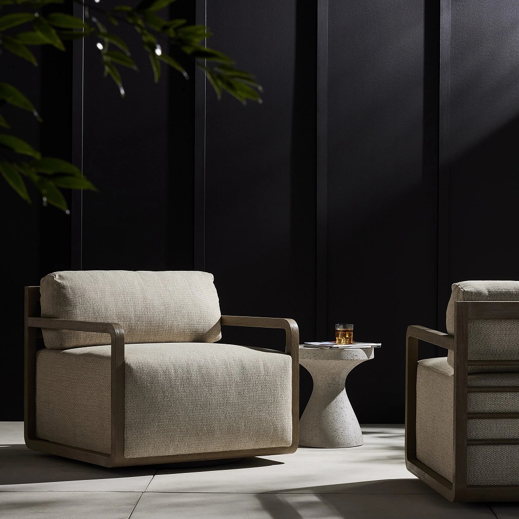 beige and wood armchair on moody dark patio