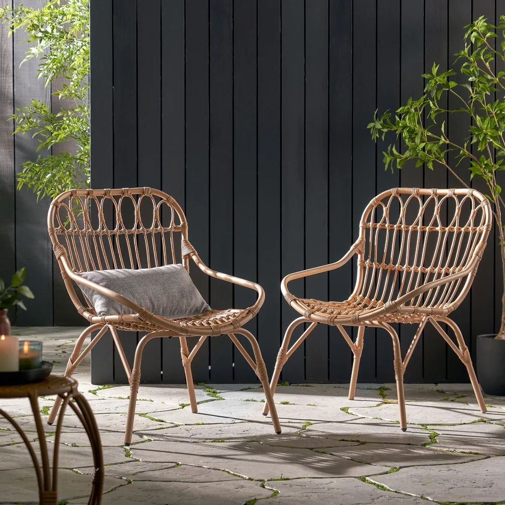 two modern rattan chairs outdoors