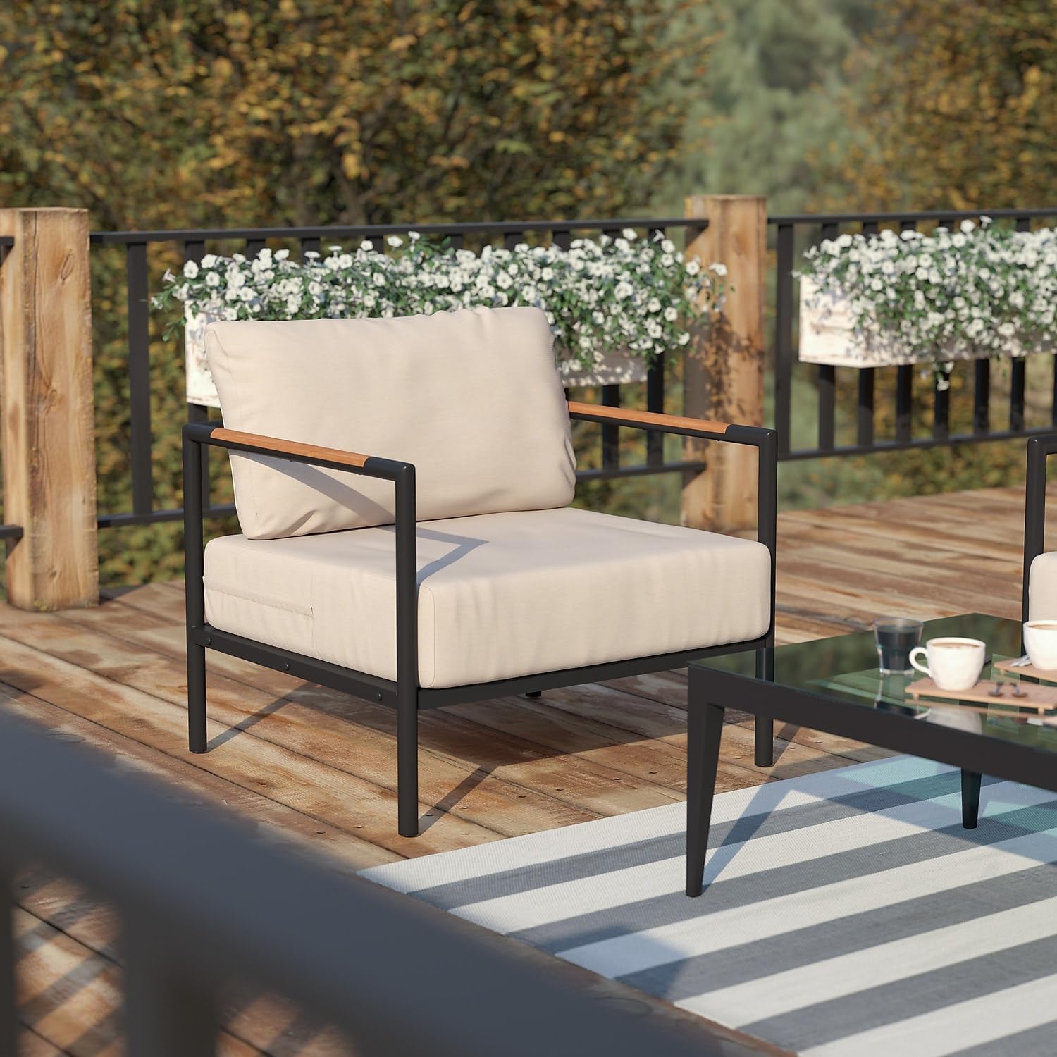 modern outdoor club chair with beige cushions