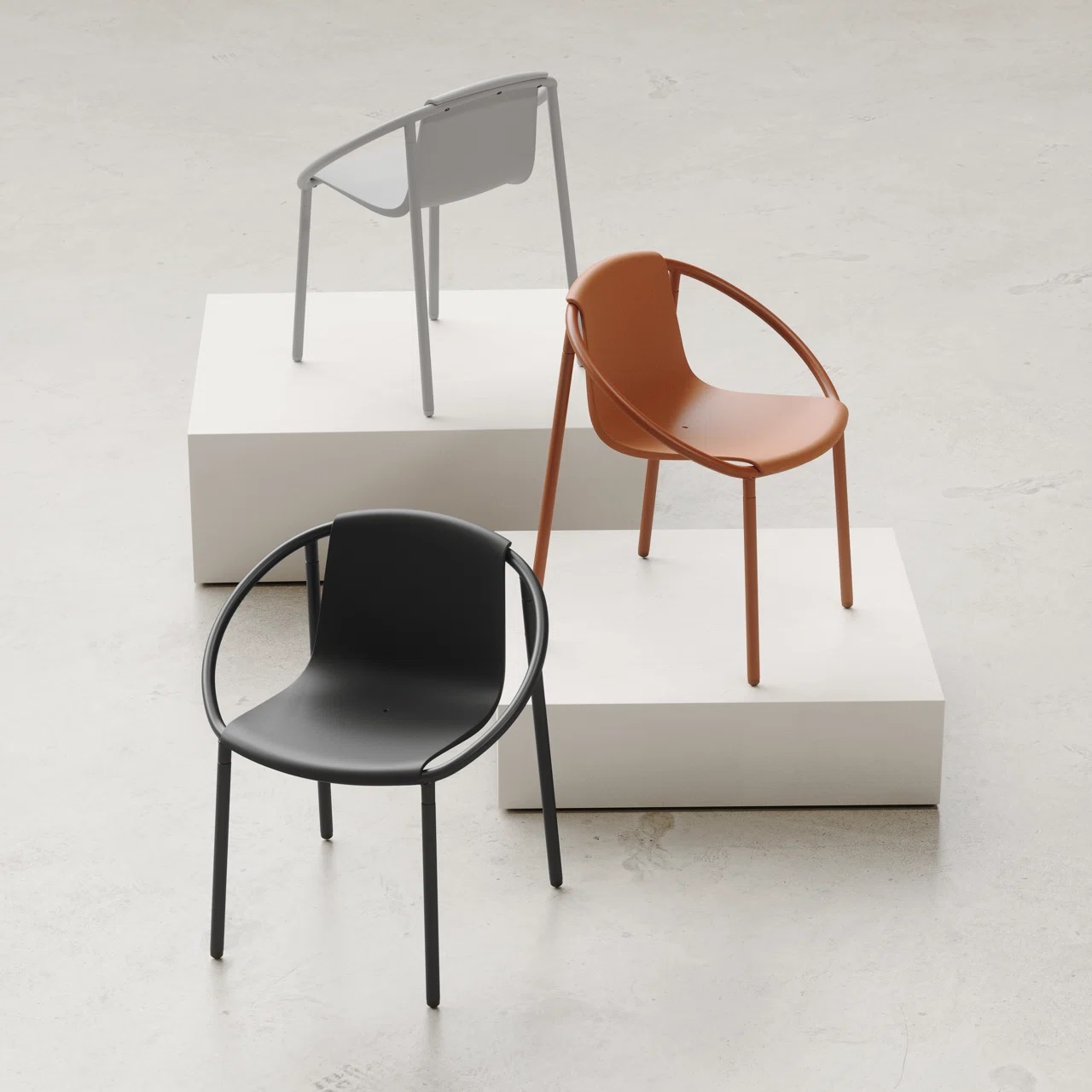 ring shaped contemporary outdoor chairs in black, orange, and white