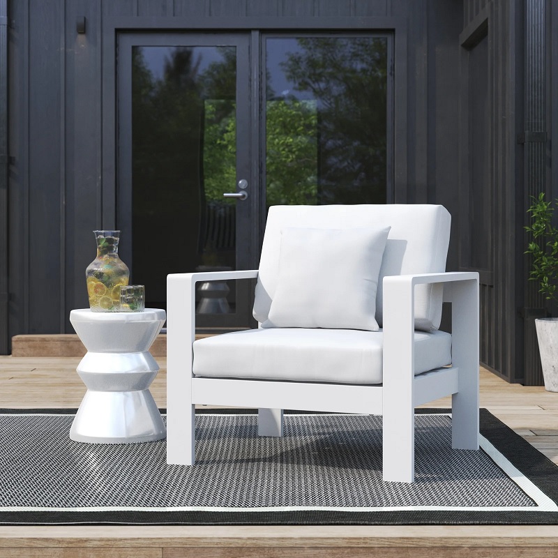 all white armchair on patio