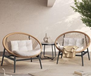 round modern wicker chairs on beige patio