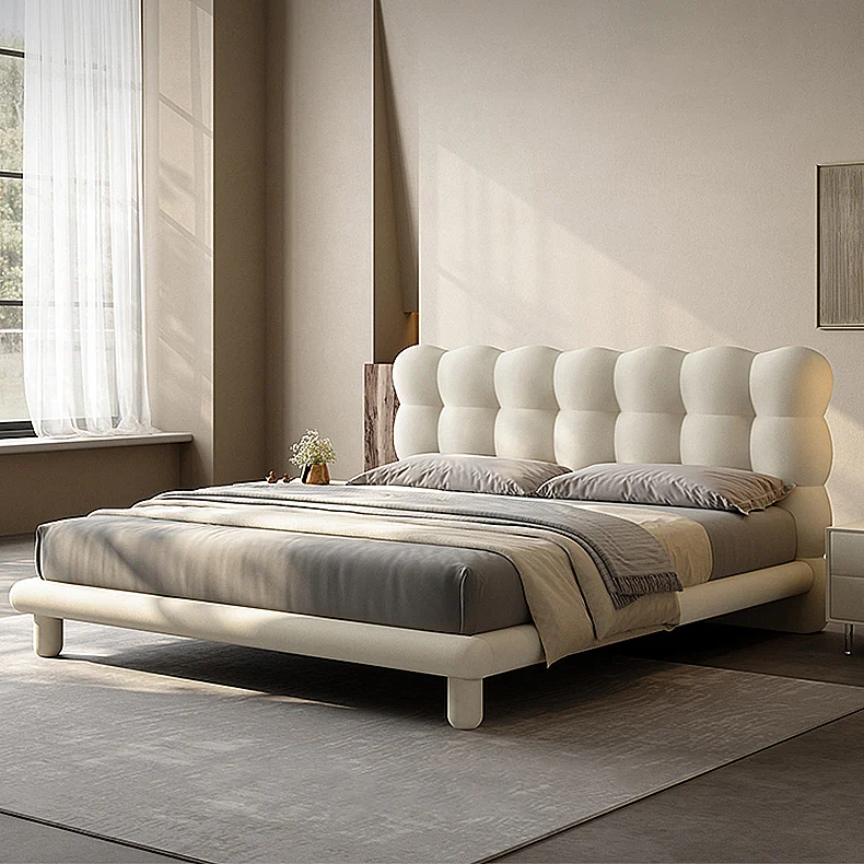 White upholstered bubble platform bed