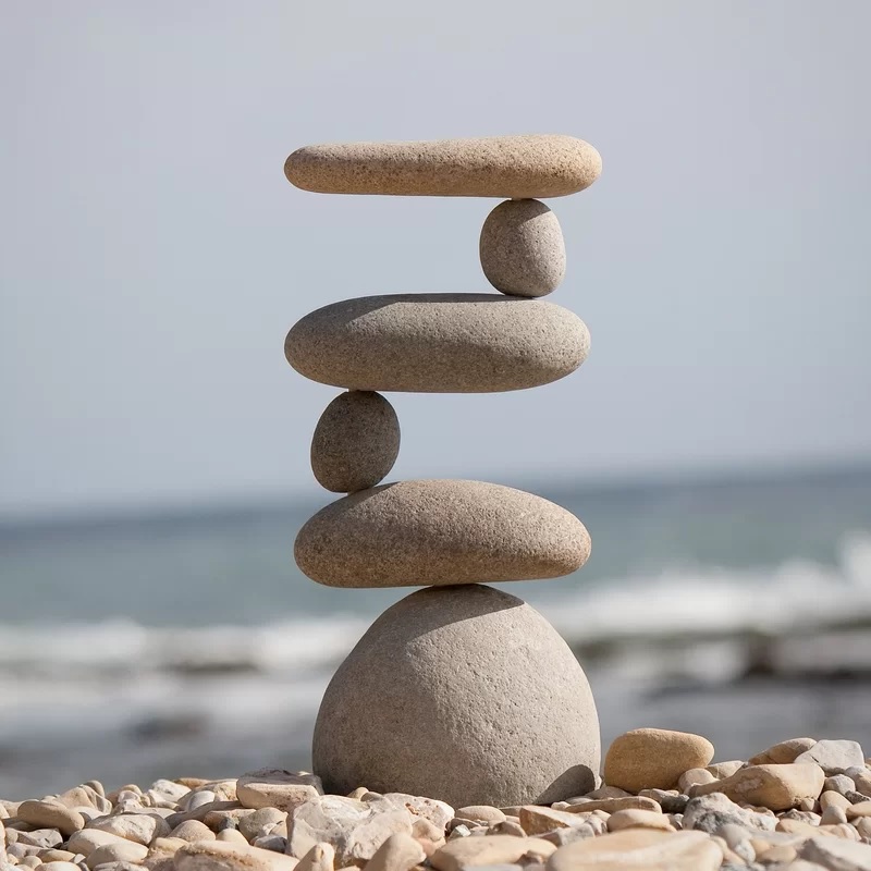 Stone cairn garden statue