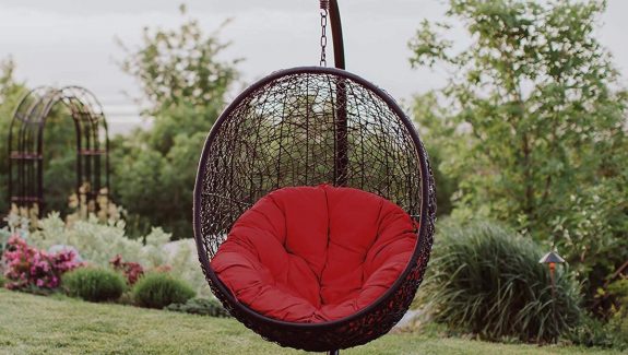 https://www.home-designing.com/wp-content/uploads/2019/05/Dark-Brown-Hanging-Outdoor-Egg-Chair-With-Stand-And-Red-Cushion-Porch-Swing-575x325.jpg