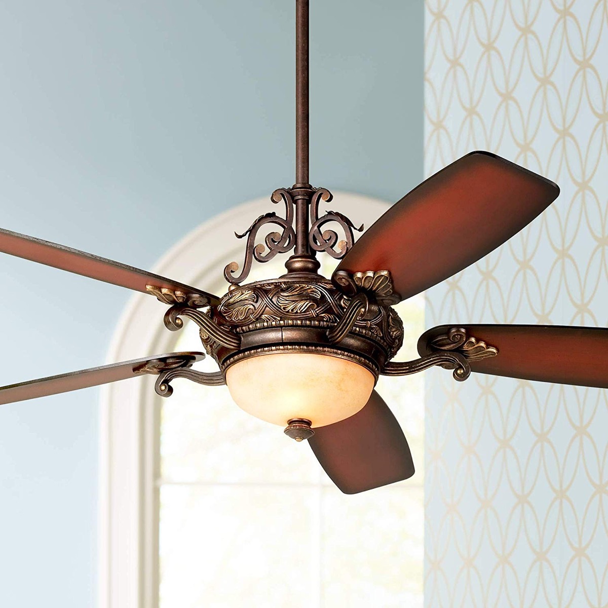 Ornate traditional ceiling fan with light