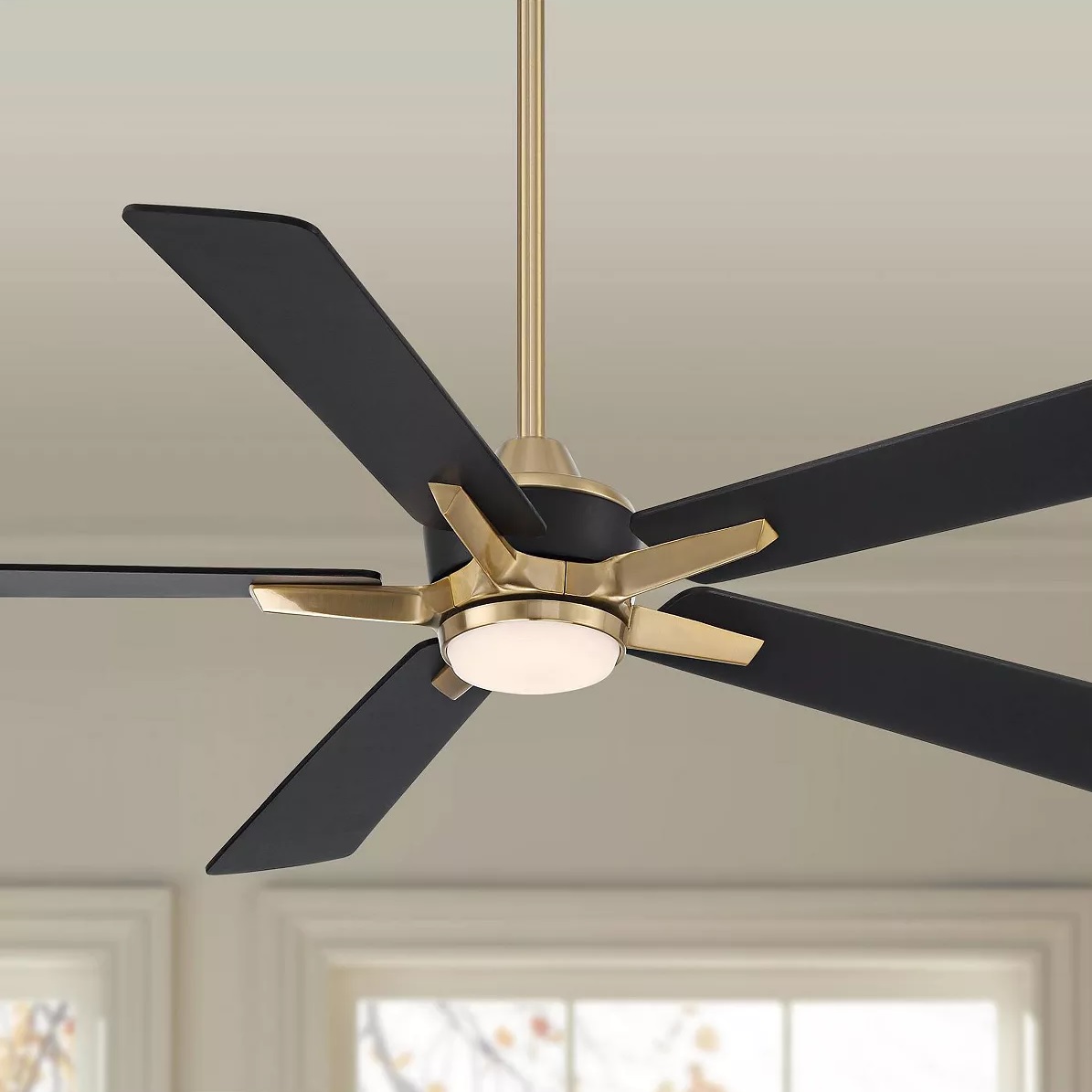 Elegant black and gold ceiling fan with light