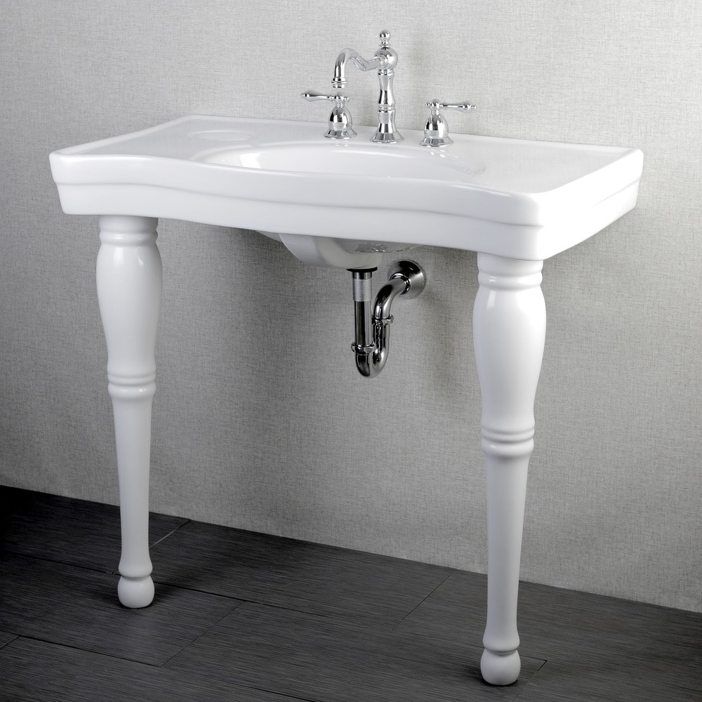 vintage white pedestal sink with two legs