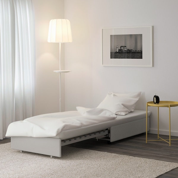 https://www.home-designing.com/wp-content/uploads/2020/03/armless-sleeper-chair-IKEA-white-upholstery-minimalist-multipurpose-furniture-inspiration.jpg