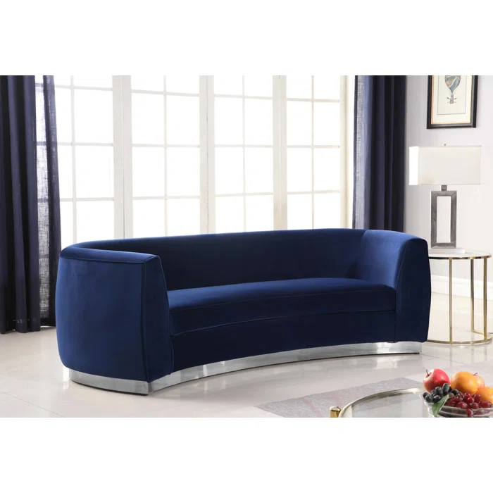 Blue velvet curved sofa