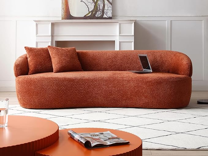 Contemporary orange curved sofa