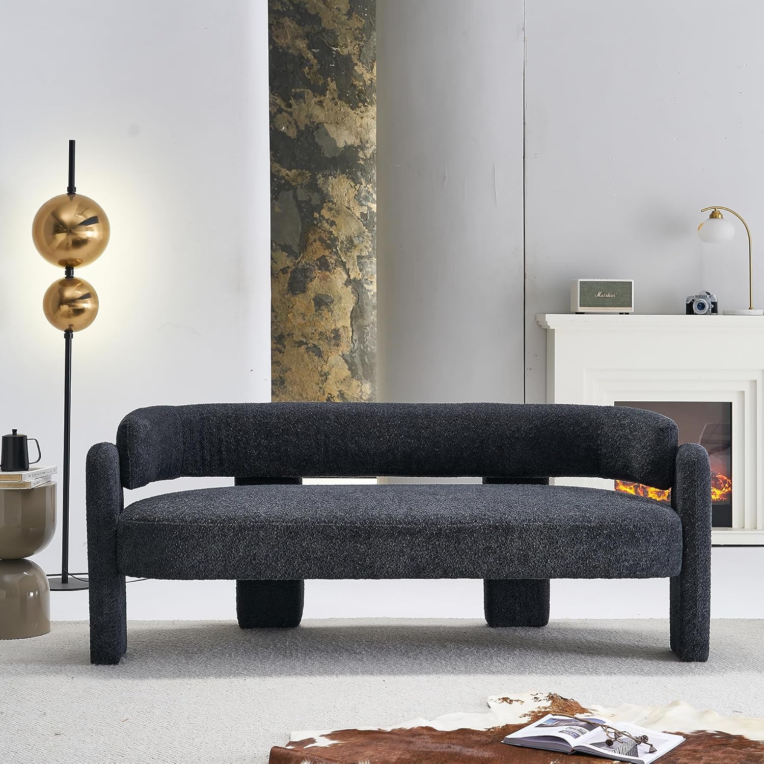 Gray upholstered curved sofa