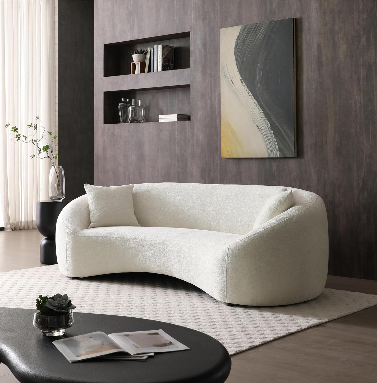 Minimalist white curved sofa