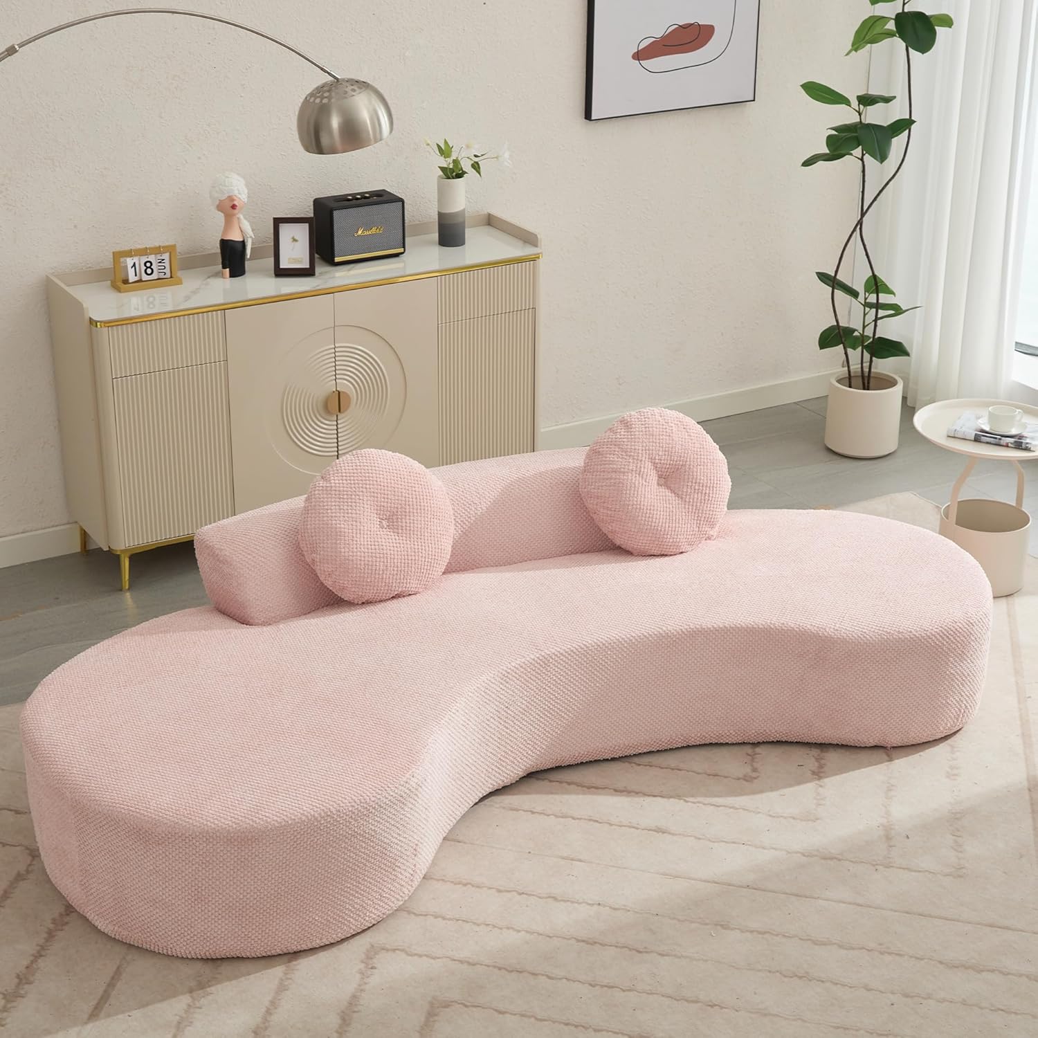 Soft pink minimalist curved sofa