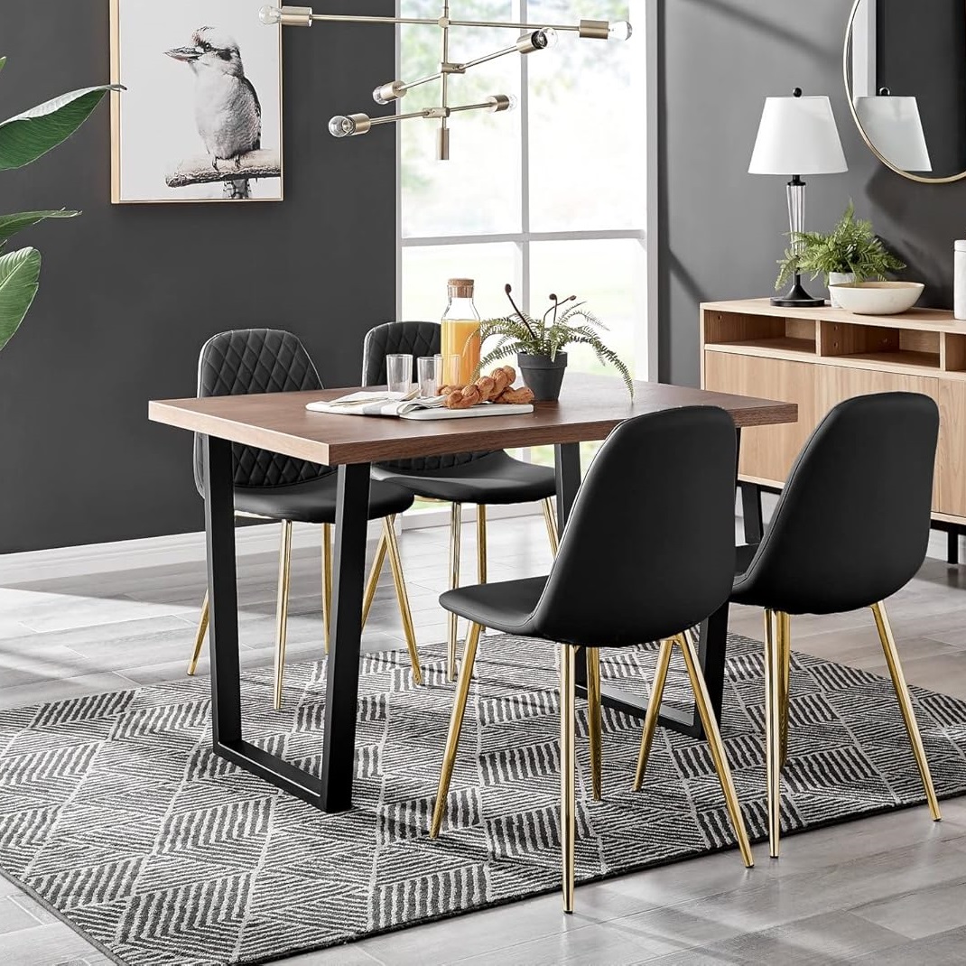 Industrial dining table with glam chairs