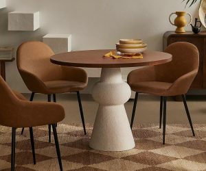 Pedestal table with textured white base and birch wood tabletop