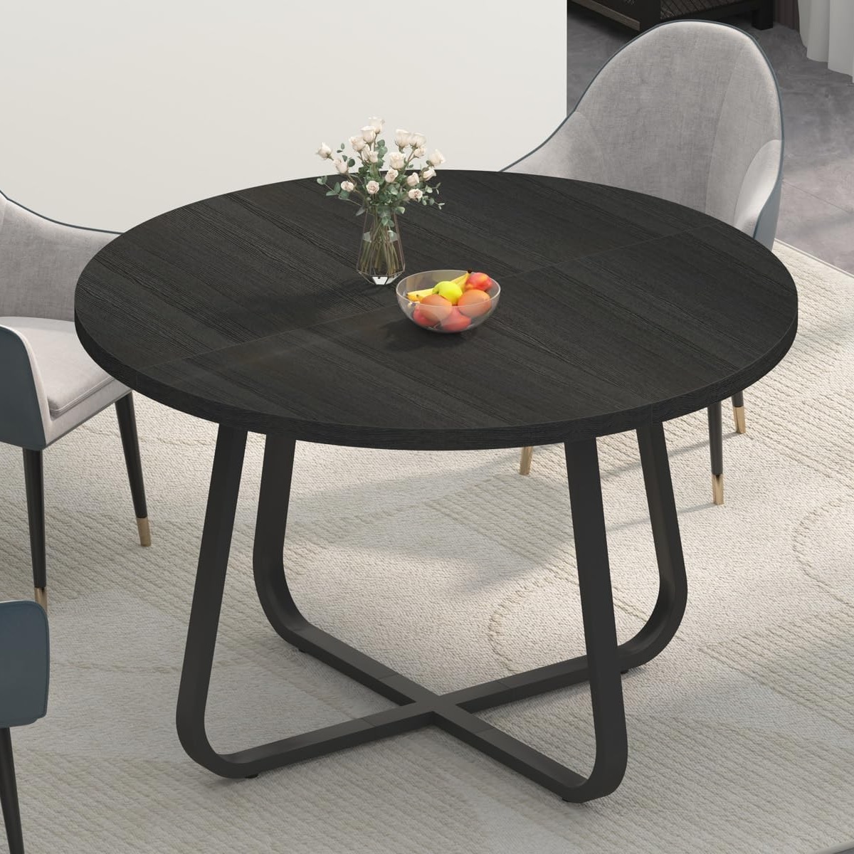 Black dining table with cross base