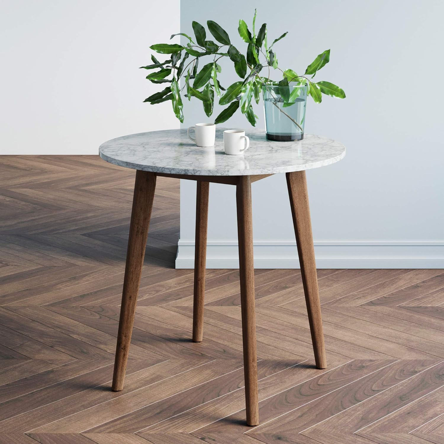 Small dining table with wood legs and faux marble top