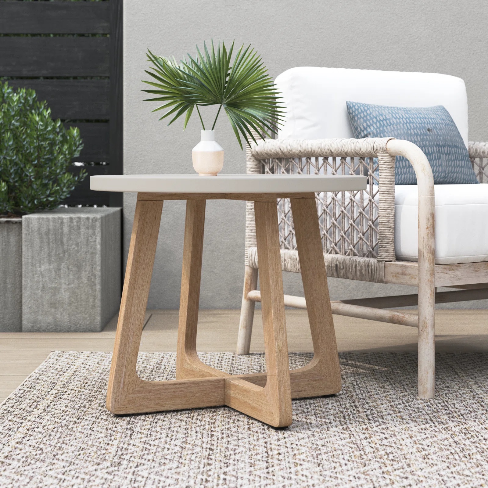 Outdoor table with wood base and white tabletop