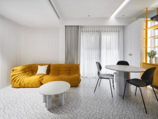 Confident Black, White & Yellow Interiors For Young Professionals