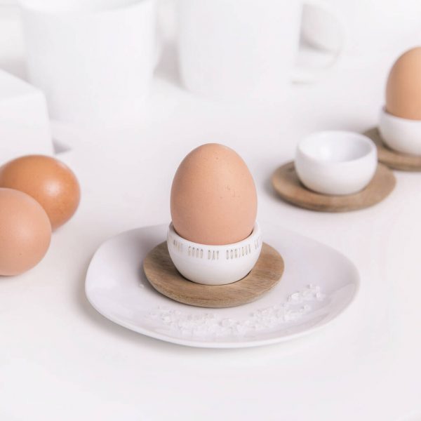 https://www.home-designing.com/wp-content/uploads/2021/05/scandinavian-mini-egg-cup-beautiful-porcelain-with-wood-saucer-nordic-housewarming-gift-inspiration-breakfast-tableware-for-sale-online-600x600.jpg