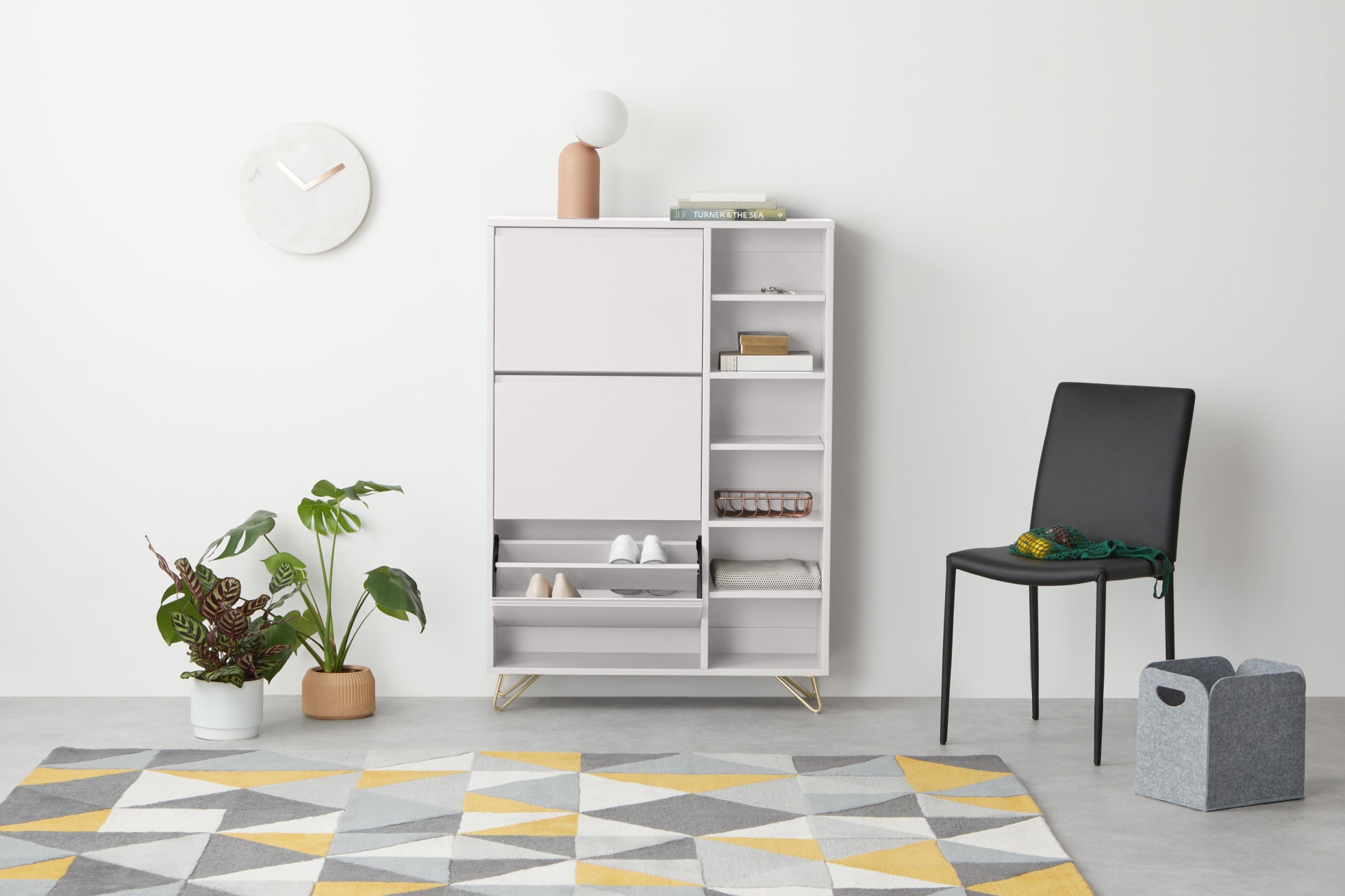 https://www.home-designing.com/wp-content/uploads/2021/09/minimalist-white-shoe-cabinet-slim-streamlined-organization-options-for-entryway-living-room-storage-furniture-gold-hairpin-legs.jpg