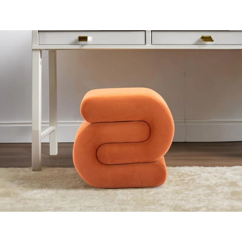 Orange S shaped entryway stool