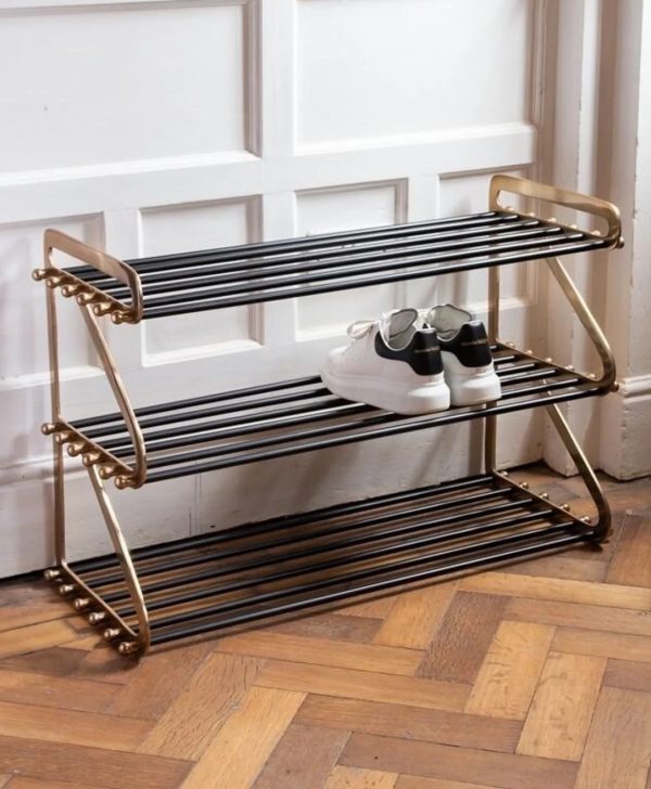 https://www.home-designing.com/wp-content/uploads/2022/03/high-end-designer-black-and-brass-metal-shoe-rack-three-tier-storage-for-entryway-stylish-entryway-furniture-accessories-organization-ideas-metal-racks-for-sneakers-boots-600x728.jpg