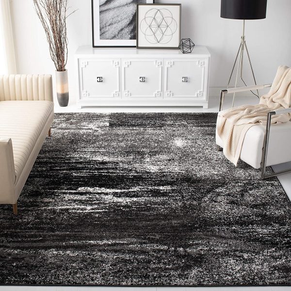 https://www.home-designing.com/wp-content/uploads/2022/07/black-and-white-rugs-for-living-room-abstract-pattern-modern-minimalist-floor-coverings-for-comfortable-family-homes-stain-resistant-soft-synthetic-rugs-designer-rug-amazon-600x600.jpg