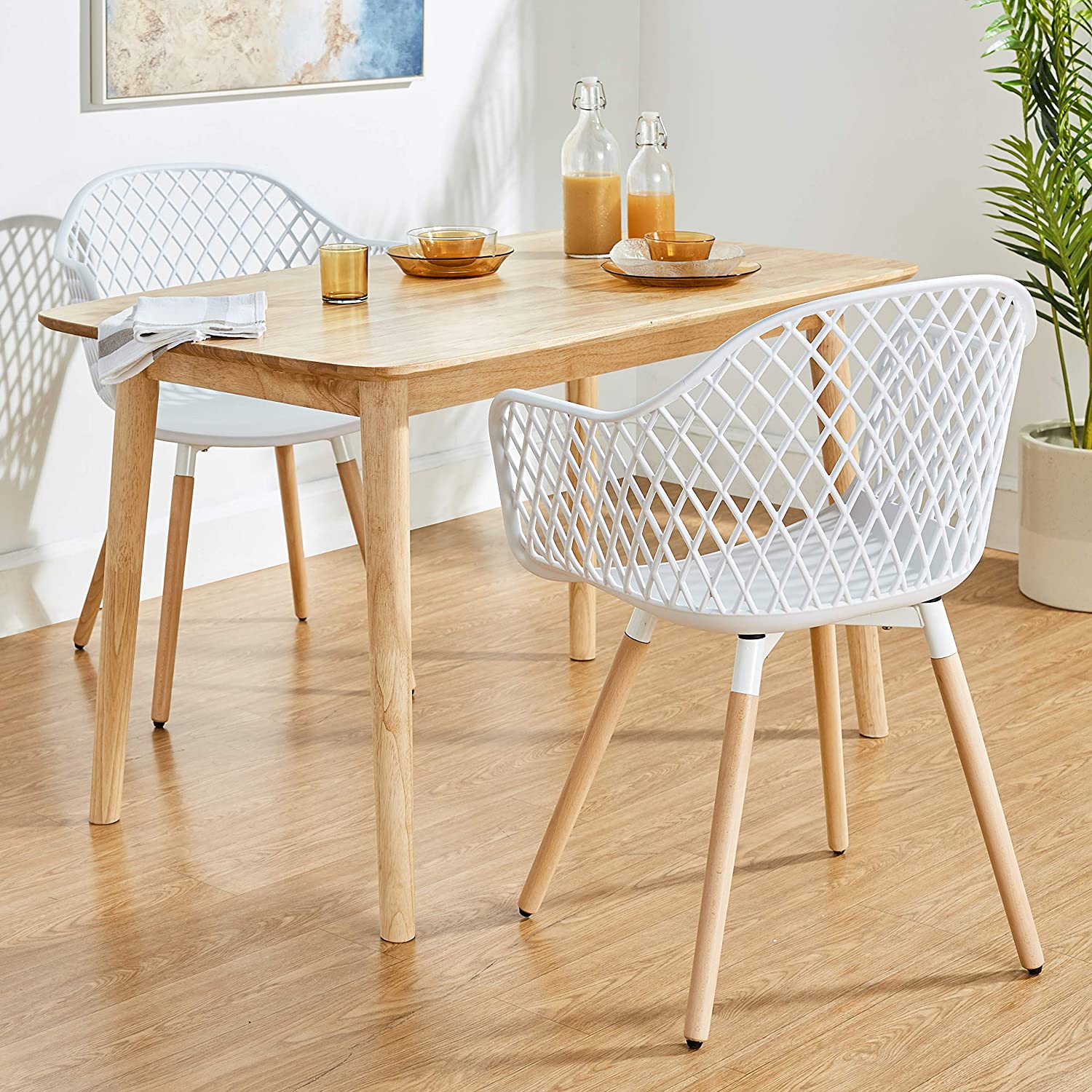 contemporary white plastic chairs with lattice backrest and armrests