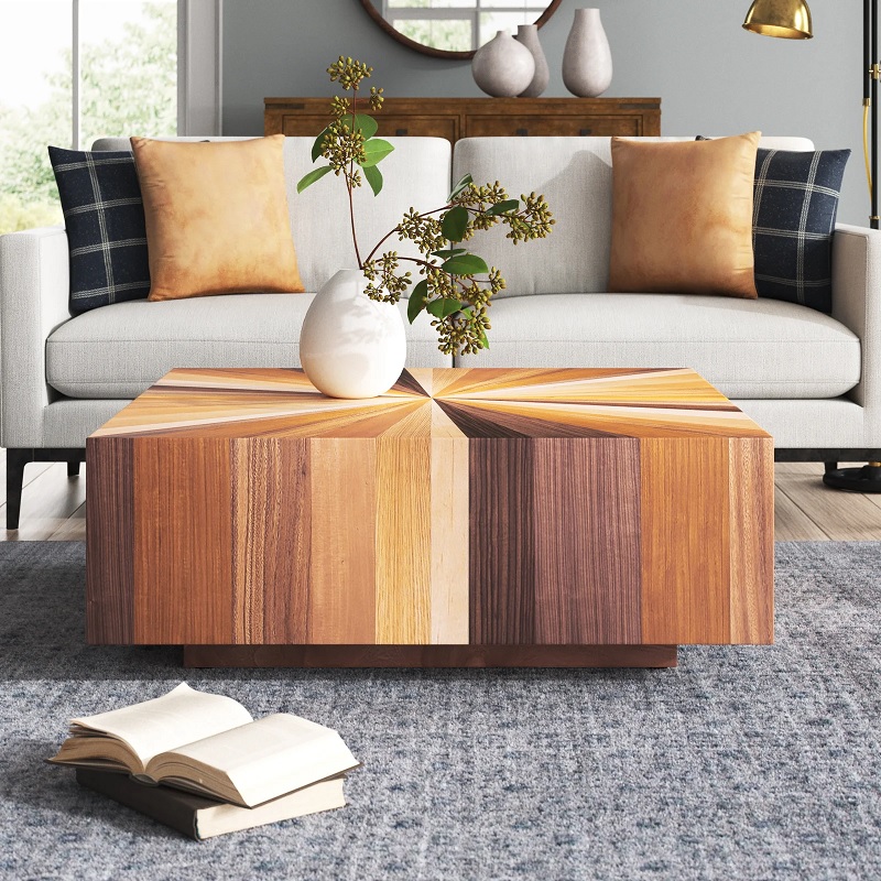 https://www.home-designing.com/wp-content/uploads/2023/04/multicolor-large-wooden-coffee-table-with-starburst-tabletop-pattern-unique-postmodern-furniture-ideas-for-contemporary-living-room-decor-theme-43-inch-square-cocktail-table.jpg