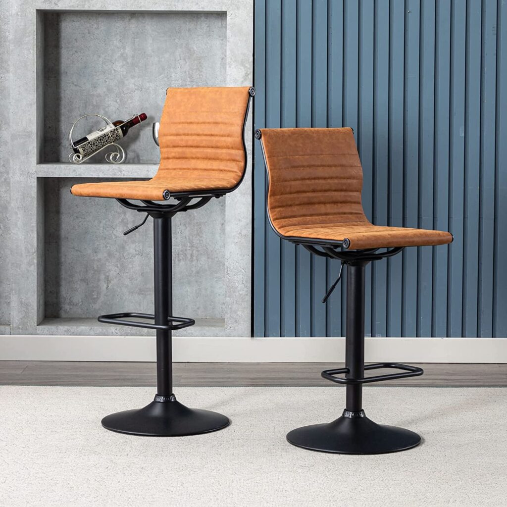 swivel upholstered bar stools with camel faux leather upholstery and ...