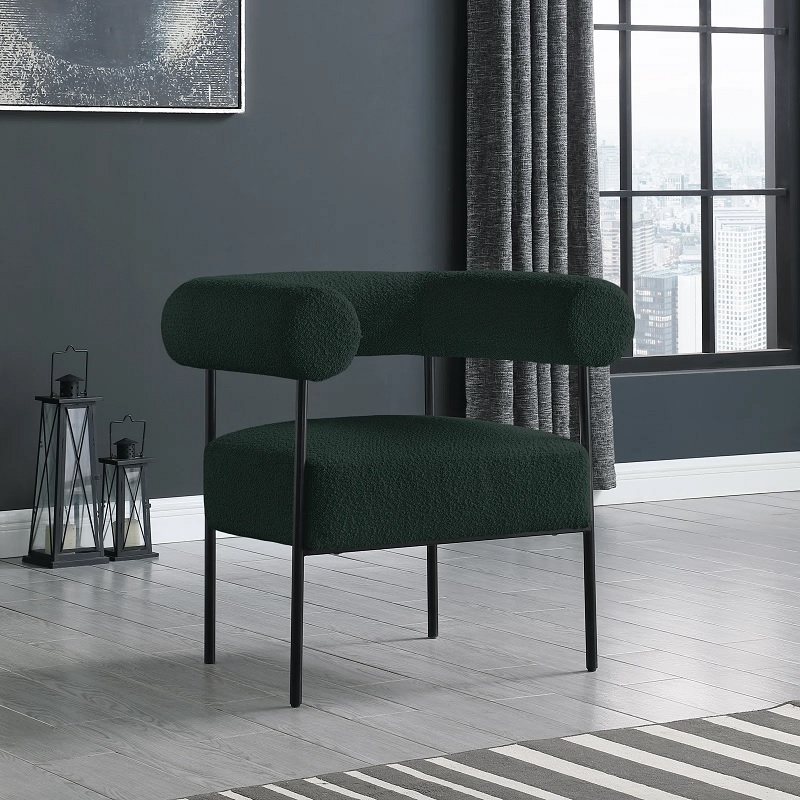 modern accent chair green boucle upholstery performance polyester rounded barrel back cylindrical tight cushioned seat black metal framing industrial living room furniture luxe