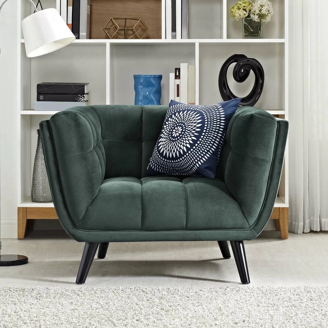 muted dark velvet green accent chair with interior tufting and smooth exterior tapered black legs ultra modern living room furniture comfortable armchair for office entryway